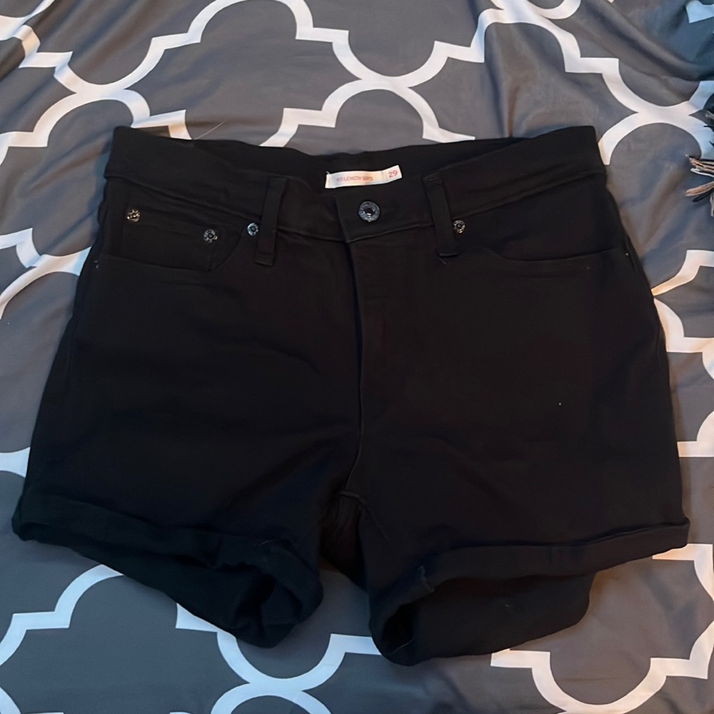 Levi’s mid-length black Jean shorts